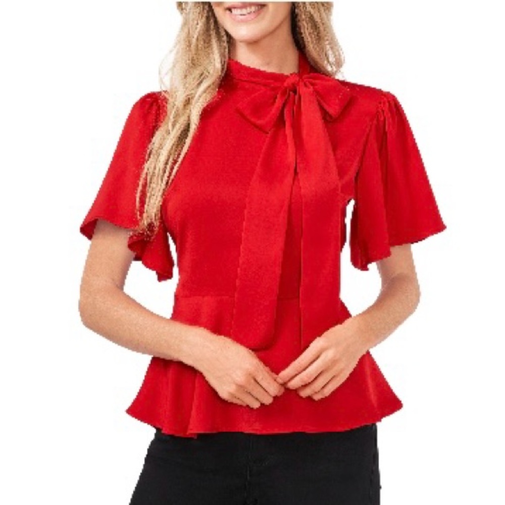 CeCe Charm Tie Neck Peplum with flouncy sleeve. Size large
Luminous Red